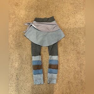 Women’s skirt/leggings/leg warmers built in together